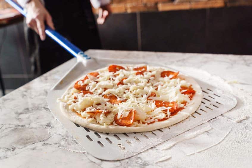 Transfer pizza to oven