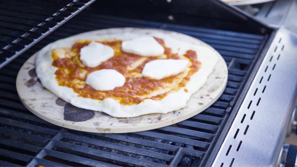 cooking pizza on grill