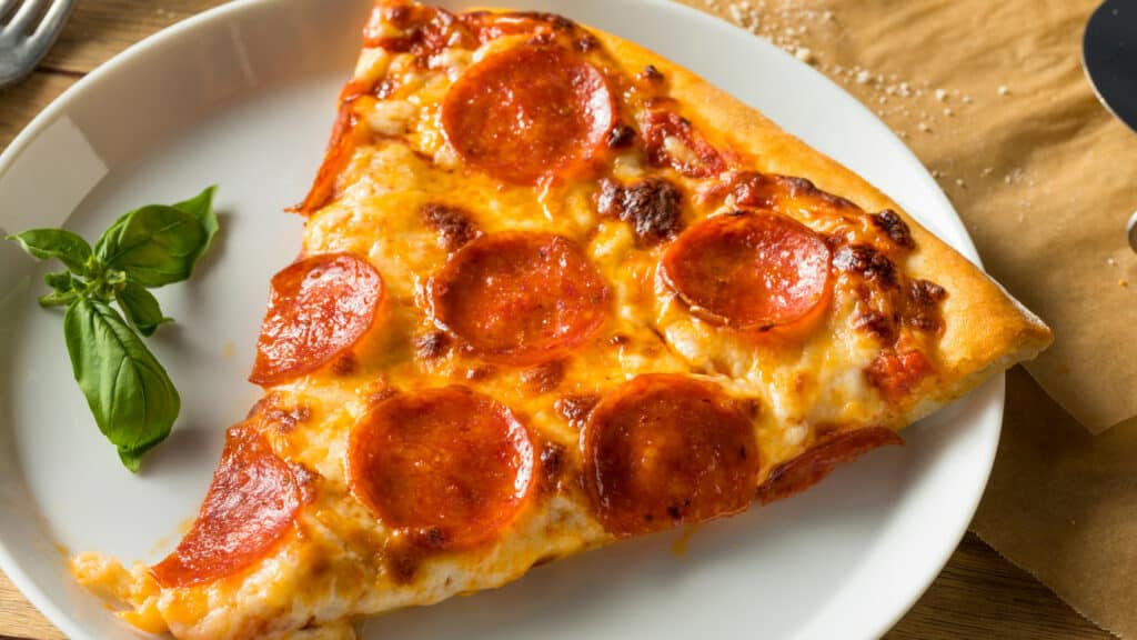 Thin crust pizza slice