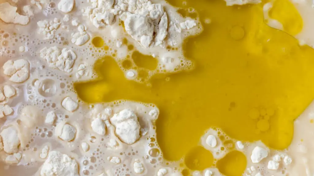 Closeup of flour water yeast and oil