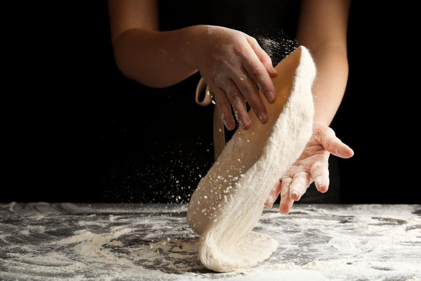 Hand slap method for shaping pizza dough