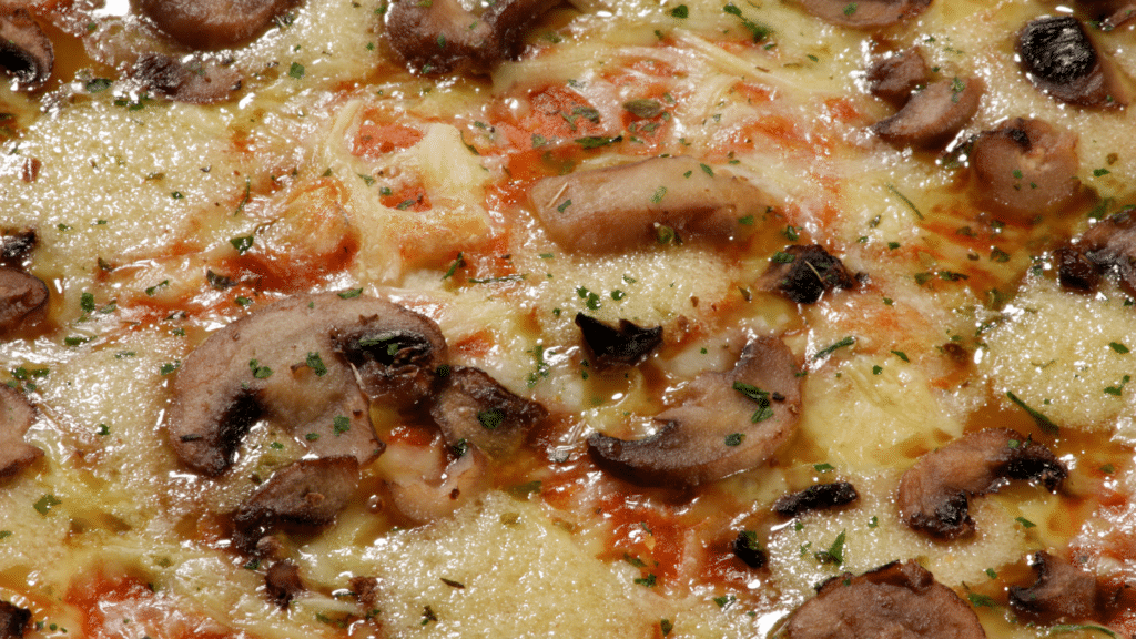 soggy pizza with fresh mushrooms