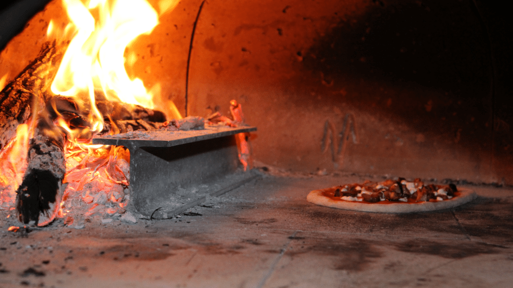 Wood burning in pizza oven