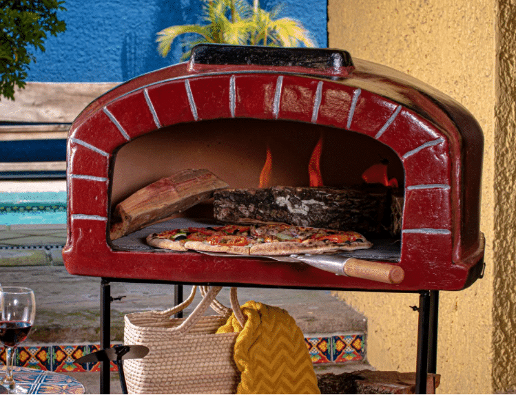 pizza in clay pizza oven